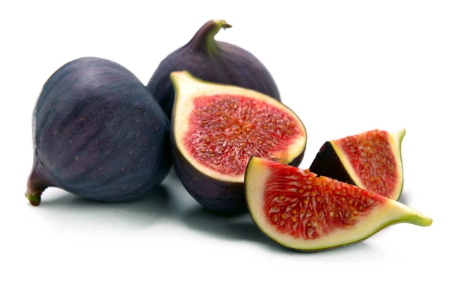 The picture shows the fruits of common figs with dark purple skin and deep pink flesh. 