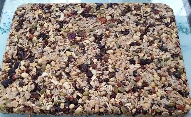 The picture shows a vegan breakfast nut slab.