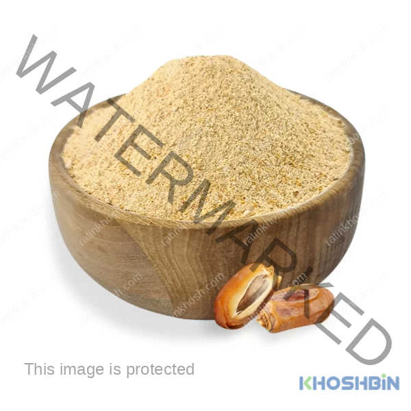 Date sugar in a bowl and two date fruits on the side