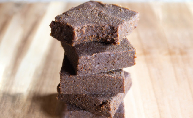 A stack of vegan-friendly, paleo date energy bars