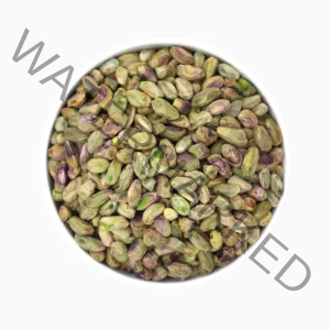 Kaal pistachio kernels in a round bowl from a top view