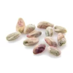 Some Kaal pistachio kernels on a piece of paper