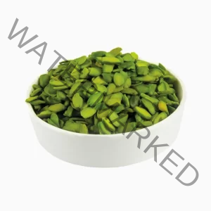 Green psitachio flakes (flaked pistachios) in a round bowl