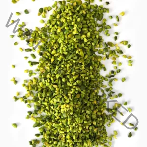 Green chopped pistachios ( 4-6 mm granules) from a close view