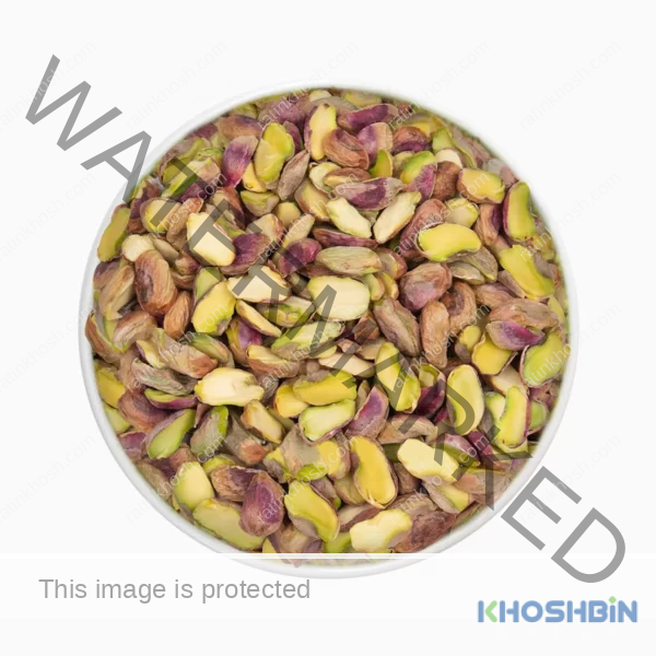 A bowl of pistachio splits (pistachio haves and pieaces)