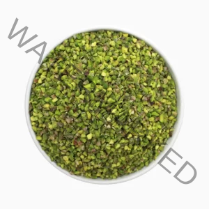 a bowl of kaal pistachio granules (chopped pistachios) from a top view