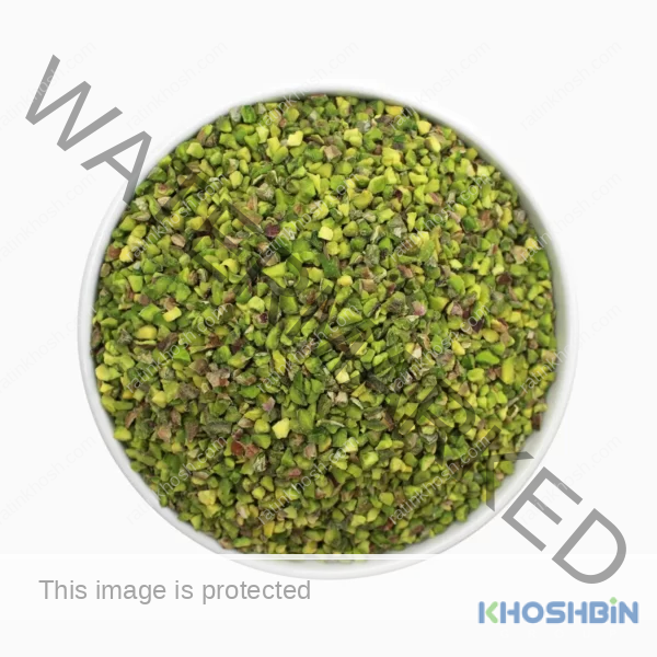 a bowl of kaal pistachio granules (chopped pistachios) from a top view
