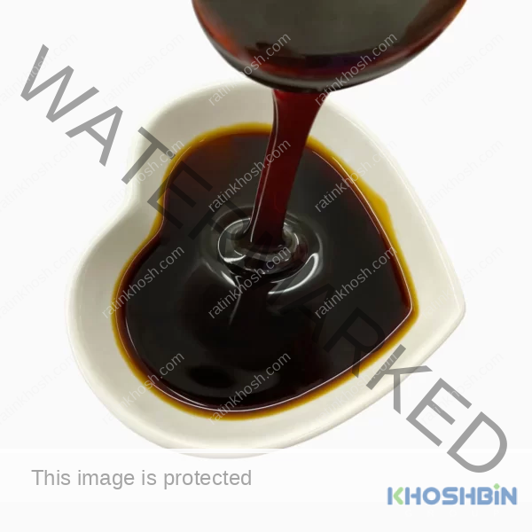 date syrup flowing into a heart-shaeped bowl