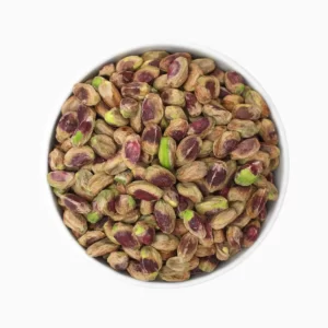 Regular pistachio kernels on a plate.