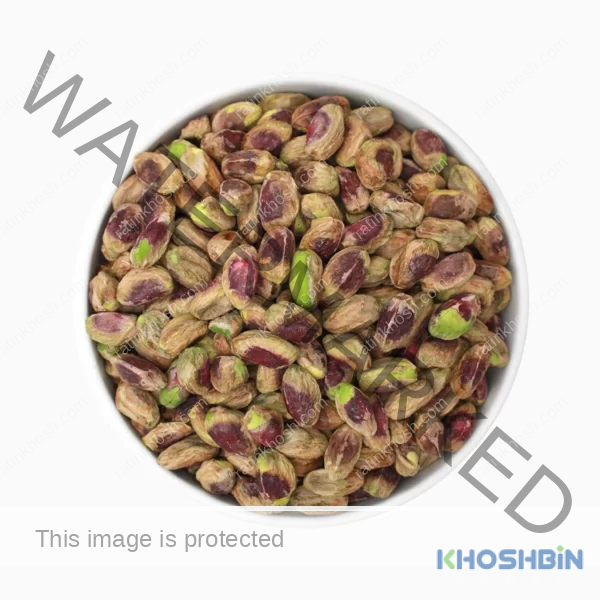 Regular pistachio kernels on a plate.