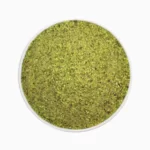 Regula pistachio powder in a round bowl from a top view