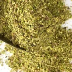 Pistachio granule/meal in a dipper