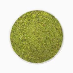 Kaal pistachio granule or meal in a round bowl shown from above