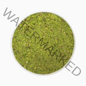 Kaal pistachio granule or meal in a round bowl shown from above